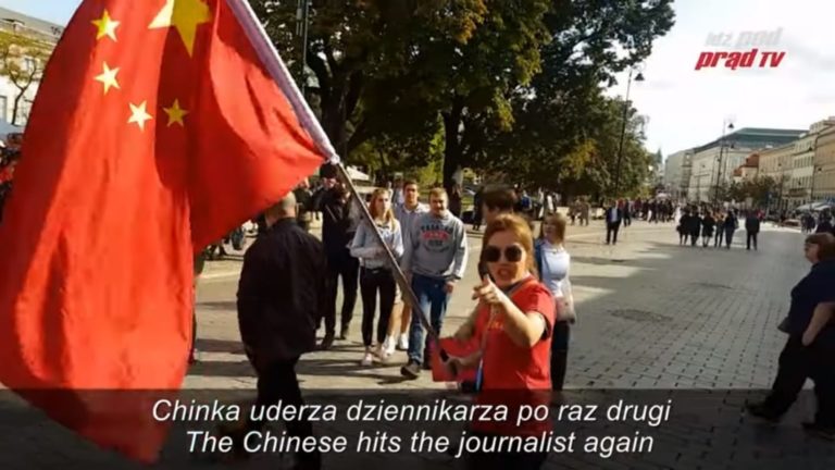 Communist Chinese attack Poles in Warsaw! [VIDEO]