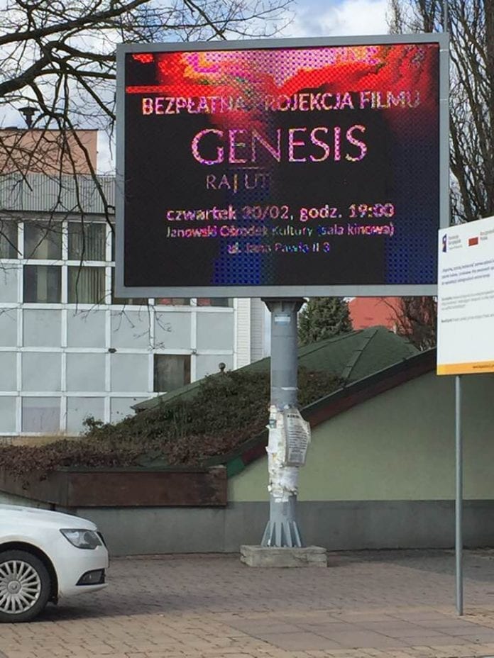 A billboard promoting a local screening of Genesis Paradise Lost. first animated 3D film about biblical story of creation.
